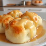 Leckere Dampfnudeln, frisch zubereitet im Airfryer für eine perfekte Süßspeise.