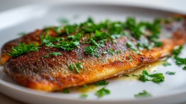 Zarte Forelle, perfekt zubereitet im Airfryer für ein gesundes und schmackhaftes Gericht.