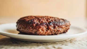 Saftiges Burger Patty, zubereitet im Airfryer für einen perfekten Geschmack.