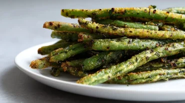 Leckere und knusprige Bohnen, perfekt zubereitet im Airfryer für ein gesundes Snack-Erlebnis.