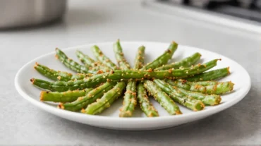 Leckere TK-Bohnen, perfekt knusprig im Airfryer zubereitet.